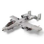 A gray toy airplane with two engines and a cockpit is visible.