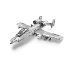 A gray toy airplane with two engines and missiles under the wings.