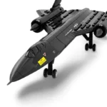 A black toy airplane with wheels and U.S. Air Force markings is displayed.