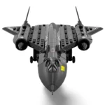 A black toy airplane with two engines and markings is displayed.