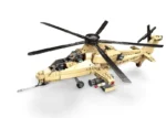 A tan toy helicopter with black rotor blades and two figures inside the cockpit.