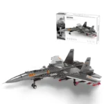 A gray toy airplane with red accents and a box are visible.