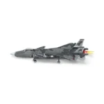 A gray toy jet with camouflage pattern and two yellow flames at the back is displayed.