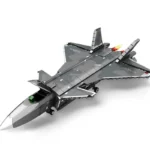 A gray and black toy jet with camouflage pattern and flames coming from the back.