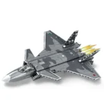A gray and silver toy jet with camouflage pattern and flames coming from the back.