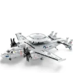 A gray toy airplane with a round radar dome and four propellers is shown.
