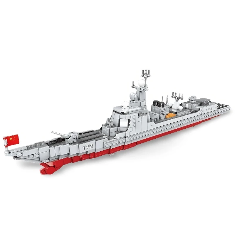 A gray and red toy warship with a Chinese flag is displayed.