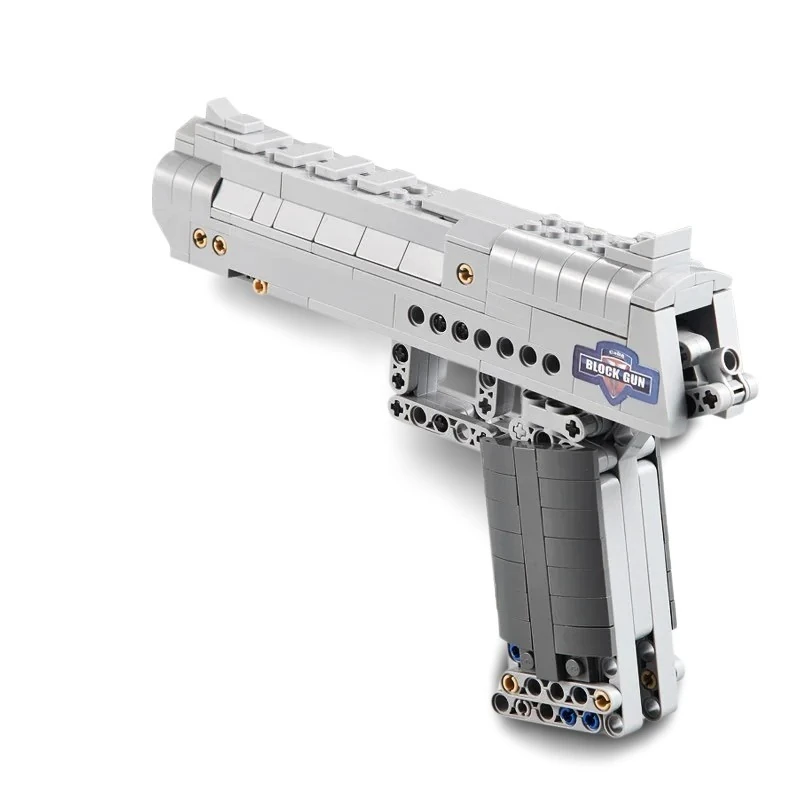 A gray toy gun constructed from interlocking blocks is visible.