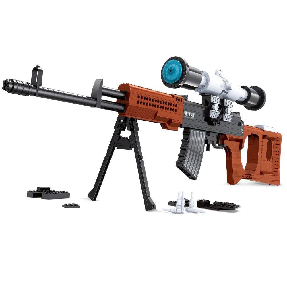 A toy sniper rifle with a scope and bipod, along with additional small toy pieces.