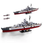 Two toy warships, one above the other, and two smaller toy warships are visible.