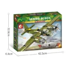 A green toy airplane model is displayed on its packaging box with dimensions indicated.