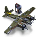 A green toy airplane with black propellers and a small tower with a ladder are displayed.