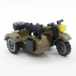 A toy motorcycle with a sidecar and a mounted gun is displayed.