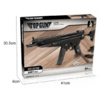 A black toy assault rifle is displayed on a box with the text "TOP GUN" and "MP5 ASSAULT RIFLE".