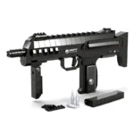 A black toy assault rifle with a magazine, bullets, and additional pieces are displayed.