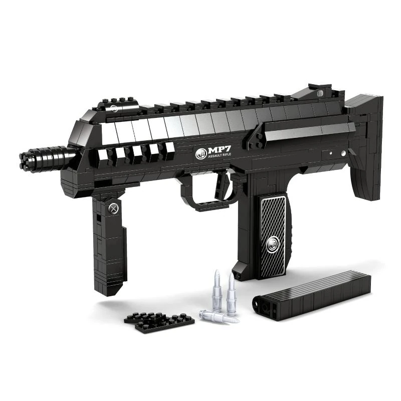 A black toy assault rifle with a magazine, bullets, and additional pieces are displayed.