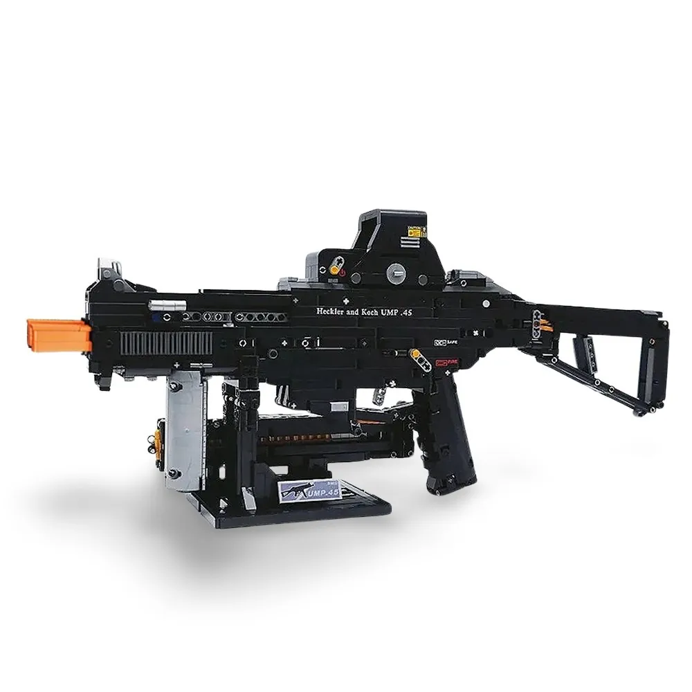 A black toy gun with an orange tip sits on a stand.