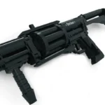 A black brick toy gun with a cylindrical magazine and a handle is visible.