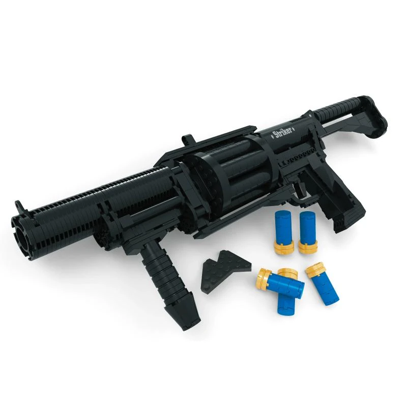 A black toy gun with a rotating cylinder and several blue and gold toy bullets.