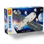 A box displays a toy space station with solar panels and three astronaut figures.