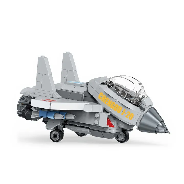 Gray toy jet with blue missiles, yellow text, and a clear cockpit.