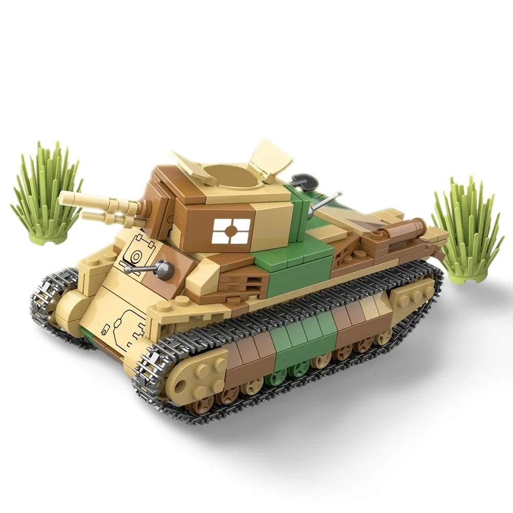 A toy tank made of building bricks with two guns and two small green plant pieces.