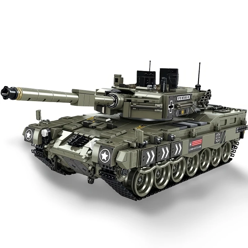 A toy tank with a long barrel, multiple wheels, and star and arrow decals.