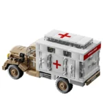 A toy ambulance vehicle made of building bricks, with red crosses on the sides and top.