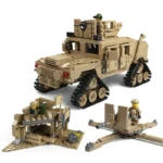 A tan military vehicle with tracks, a small structure, and an artillery piece with three figures.