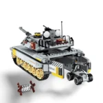 A gray toy tank with yellow accents and a small vehicle is accompanied by a coil of wire.