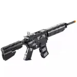 A black toy gun with a long barrel and a magazine is displayed.
