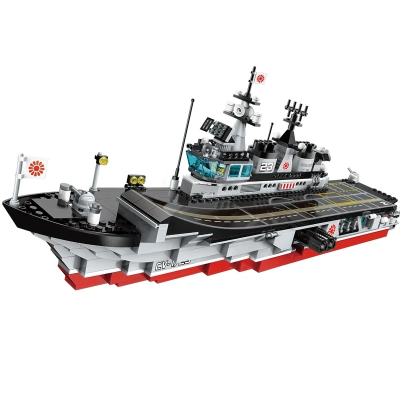 A toy ship with a black deck, white and red hull, and two flags is displayed.