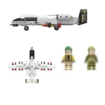 A white toy airplane with red missiles and two toy figures are displayed.