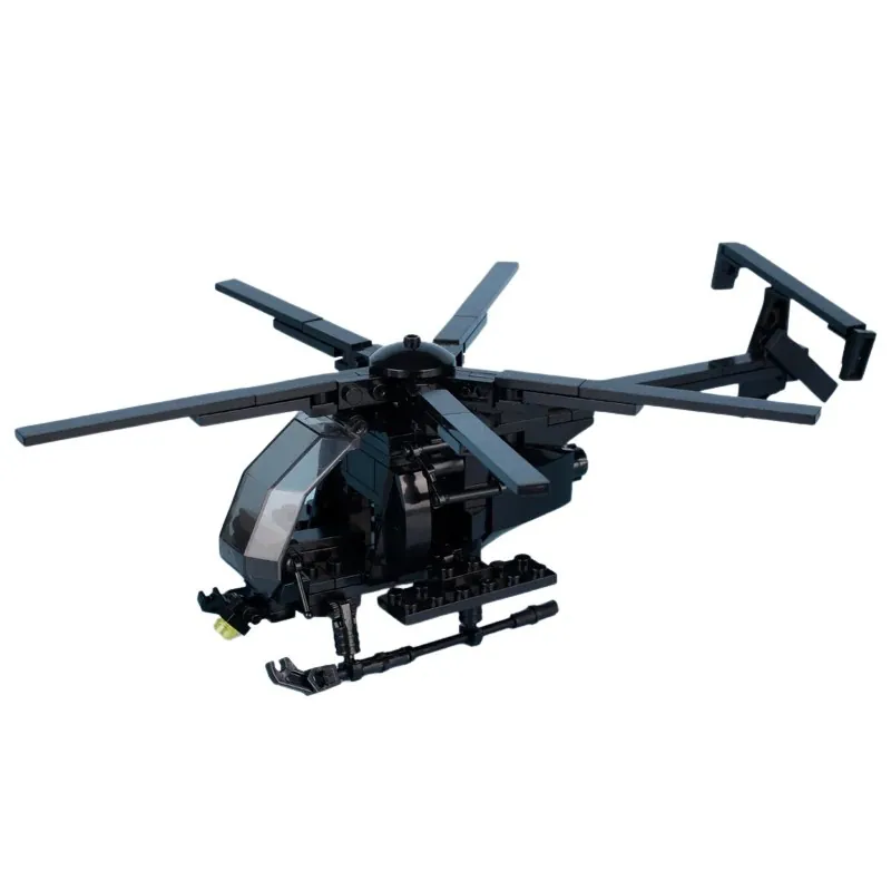 A black toy helicopter with rotating blades and a small yellow light is visible.