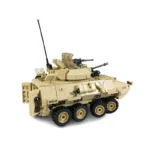 A tan brick toy military vehicle with six wheels and two mounted guns.
