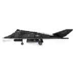 A black toy jet with a star emblem and the number 842 on the tail is displayed.