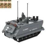 Gray toy tank with black treads, two antennas, a skull graphic, and the text "U.S. ARMY" and "E-526-3113".