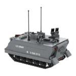 A gray toy tank with black treads, two antennas, and U.S. Army markings.