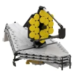 A toy model of a telescope with yellow circular mirrors and gray panels.