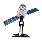 A toy satellite with blue solar panels is on a black stand.