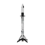 A toy rocket with a gray and white pixelated pattern stands upright on black supports.