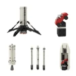 A set of brick-built rocket components including a landing stage, a car on a stand, and rocket stages.
