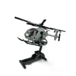 A gray toy helicopter is mounted on a black stand.