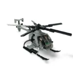A gray toy helicopter with black rotor blades and a figure inside the cockpit.