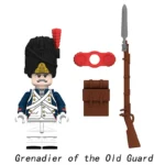 A toy soldier figure with a black hat, blue coat, brown rifle, brown bag and red connector.