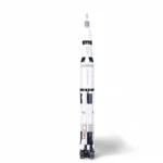 A tall, white and black rocket model with USA markings stands upright.