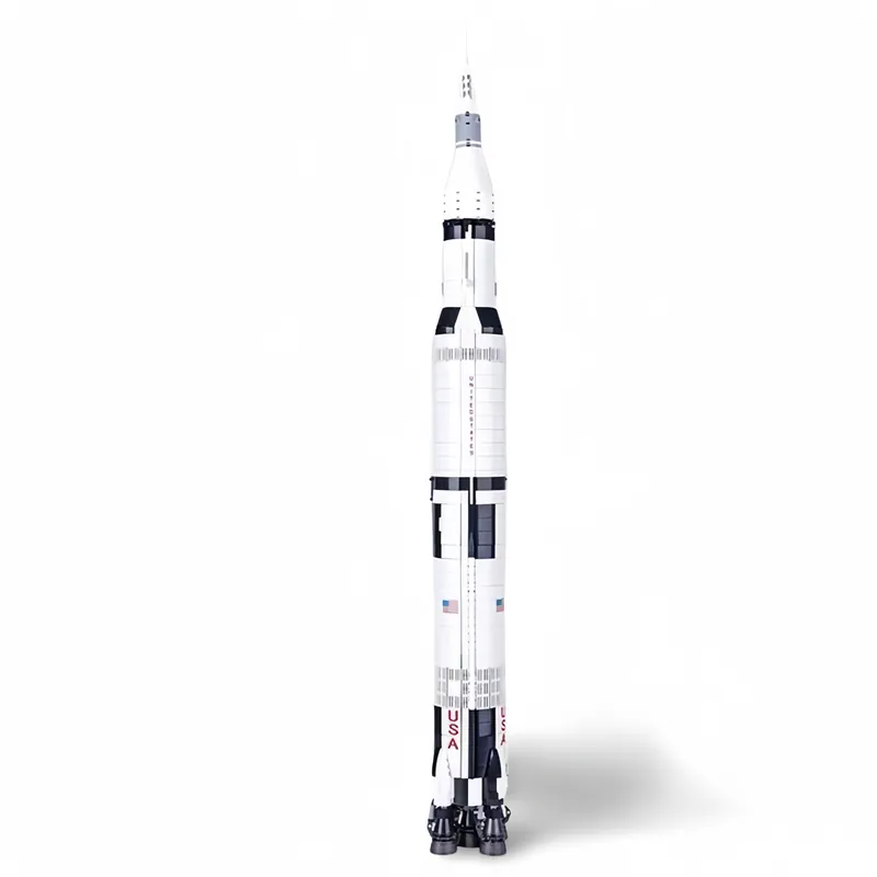A tall, white and black rocket model with USA markings stands upright.