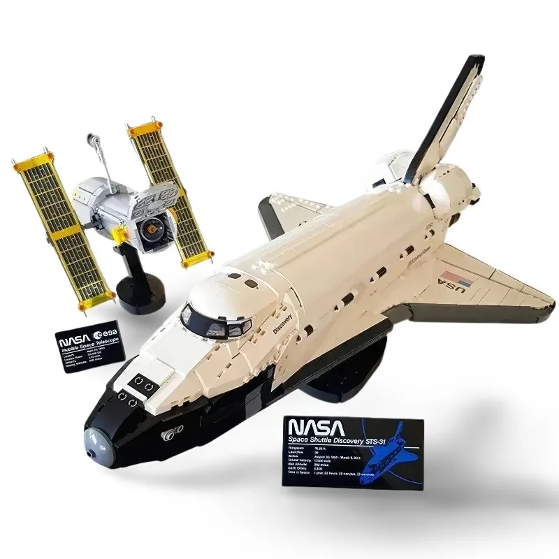 A toy space shuttle and a satellite with solar panels are displayed with two information cards.
