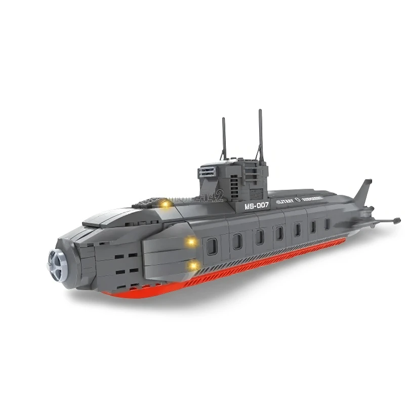 A gray toy submarine with a red stripe and two antennas.