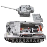 A gray brick tank toy with a removable turret and interior view.
